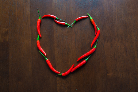Heart-shaped peppersの写真素材
