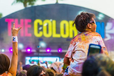 Crowds of unidentified people at The Color Run on Aug 22, 2015 in Singapore.のeditorial素材