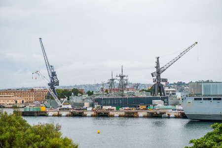 Military warship by a shipyardのeditorial素材