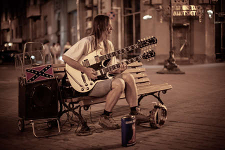 Man plays guitar on Arbat Streetの写真素材