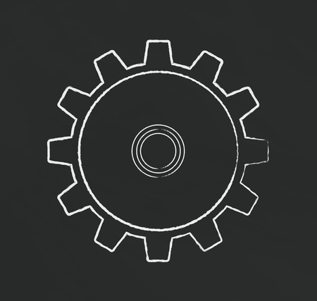 Gear drawn with chalk on a blackboard.のイラスト素材