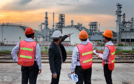 Construction workers are planning the project at the site.の写真素材