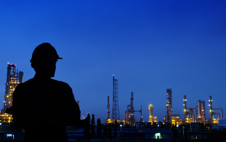 The smart industry 4.0 at morning time. Industry with blue sky. Engineer is thinking about future of industry 4.0.の写真素材