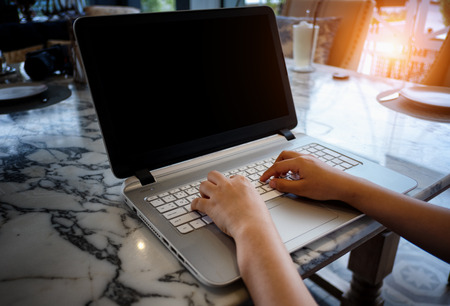 The businessman is professional working with laptop on the table.の写真素材