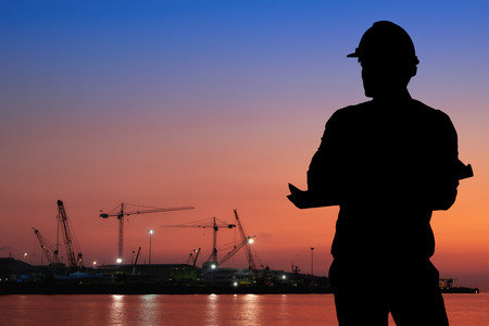 The smart industry 4.0, silhouette construction site. Silhouette engineer guy.