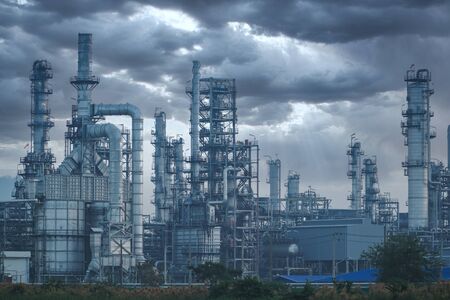 Petrochemical industry on sunset and Twilight sky, Power plant, Energy power station area.