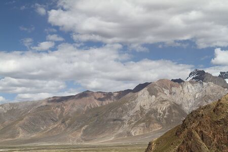 foothills of the Tibetan landscape  with mountainsの写真素材