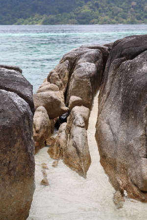 Large boulders on the beach in the islands of the archipelago Koh Lipe, Thailandの写真素材