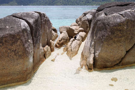 Large boulders on the beach in the islands of the archipelago Koh Lipe, Thailandの写真素材