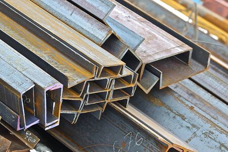 metal profile channel lies in bundles of stockの写真素材