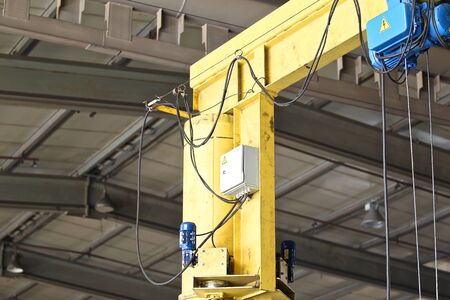 lifting mechanism for moving material within the production hallの写真素材