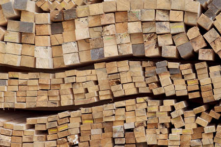 Sawn wooden boards and bars in a pack in stock, Russia