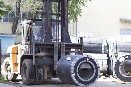 Rolls of cold-rolled galvanized steel with polymer coating in stockの写真素材
