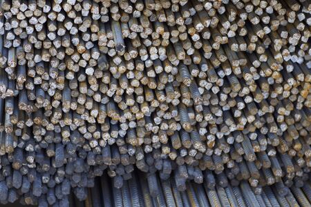 Reinforcing bars with a periodic profile in the packs are stored in the metal products warehouse,...