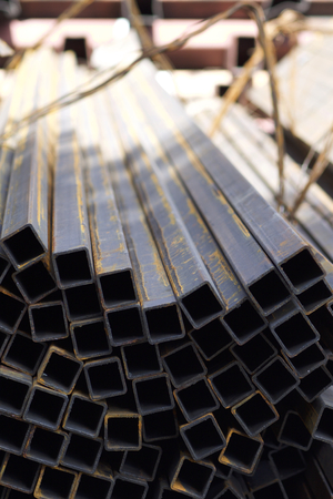 Metal profile pipe of rectangular cross section in packs at the warehouse of metal products, Russiaの写真素材