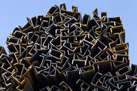 Metal profile channel in packs at the warehouse of metal products, Russia