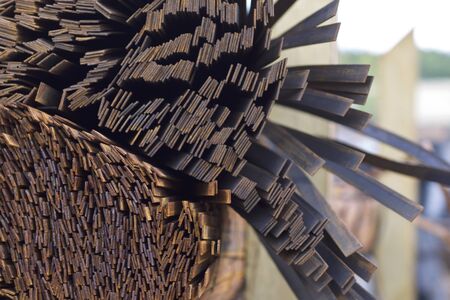 Metal profile strip in packs at the warehouse of metal products, Russiaの写真素材