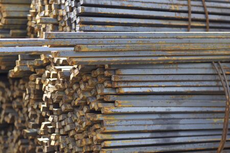 Metal profile square in packs at the warehouse of metal products, Russia