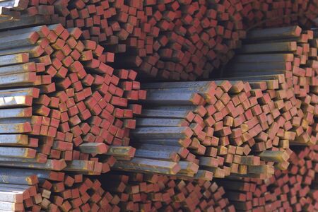 Metal profile square in packs at the warehouse of metal products, Russiaの写真素材