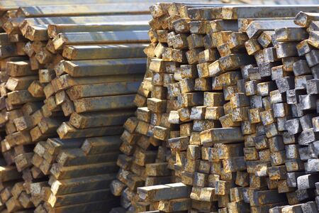 Metal profile square in packs at the warehouse of metal products, Russia