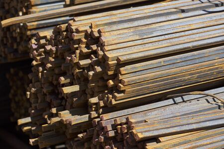 Metal profile square in packs at the warehouse of metal products, Russiaの写真素材