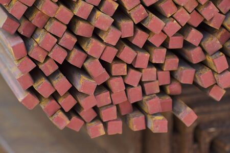 Metal profile square in packs at the warehouse of metal products, Russiaの写真素材