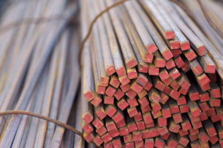 Metal profile square in packs at the warehouse of metal products, Russiaの写真素材