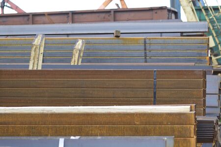 Metal profiles of different kinds are located in the metal products warehouse, Russia