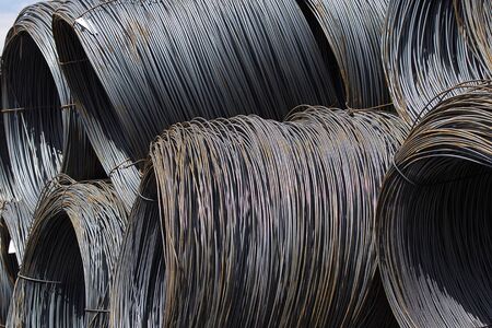 Thin metal reinforcement wound into bays at the metal products warehouse, Russia