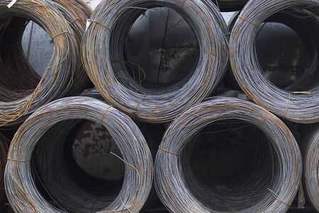 Thin metal reinforcement wound into bays at the metal products warehouse, Russiaの写真素材