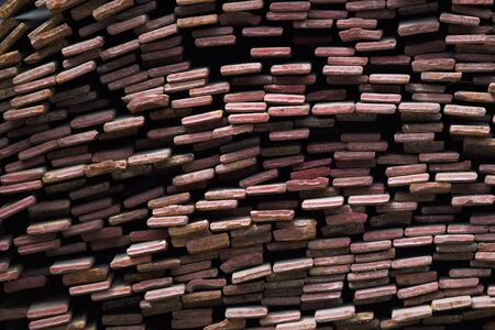 Metal profile strip in packs at the warehouse of metal products, Russia