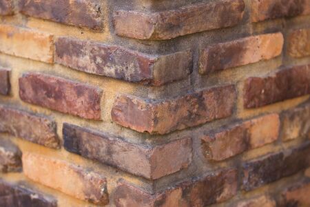 Brick masonry of red brick with a binder solutionの写真素材