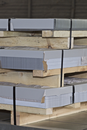 Galvanized sheet in packs in metal products warehouse, Russiaの写真素材