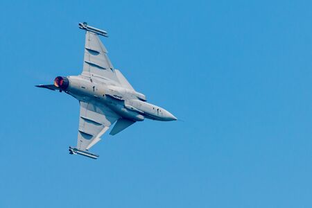 Gripen 39d jet aircraft soaring through the sky.