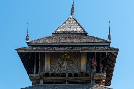 Ancient wooden roof of the old temple in Chiangrai province Northern Thailandの写真素材