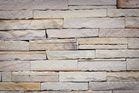 Wall made from sandstone bricks with vignette