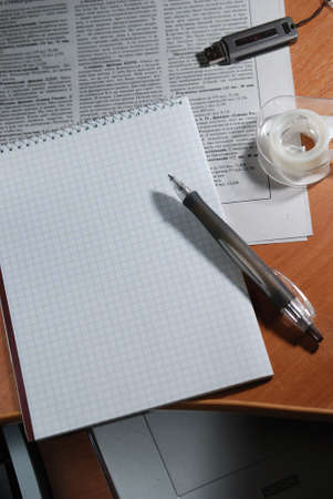 blank notebook with pencil on table