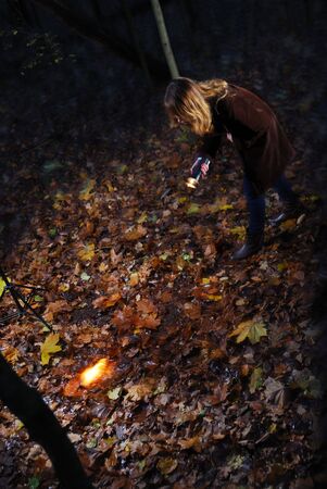 young girl searches in a wood for the lost thing