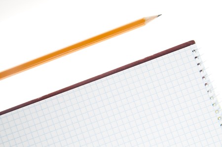 pencil and notebook over white