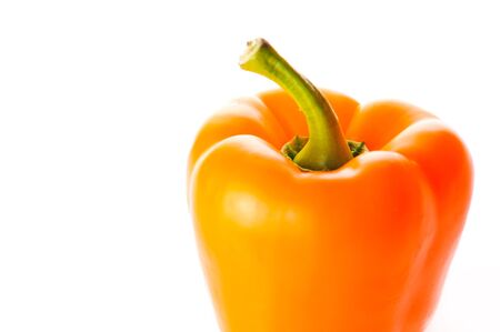 orange pepper over whiteの写真素材