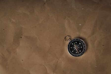 Compass over old grunge paper