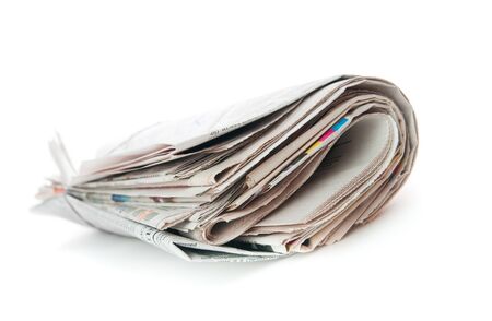 newspapers over white backgroundの写真素材