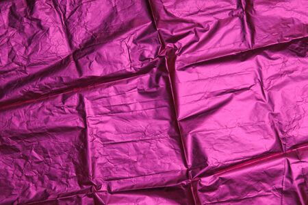 Texture of pink foil paperの写真素材