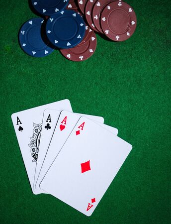 Background with four aces, playng cards and poker chips.のeditorial素材