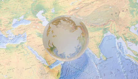 Crystal globe on global map. shallow DOF