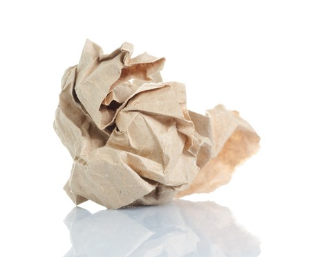 Crumpled paper isolated over white.の写真素材