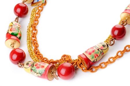 Original necklace with matrioshka, red beads and ribbon