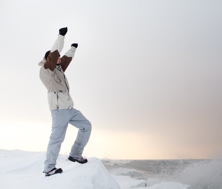 Young man standing at sea bank.の写真素材