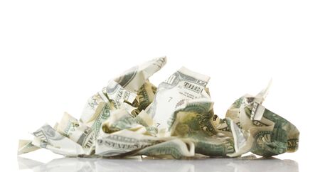 Crumpled money. Isolated over white.の写真素材