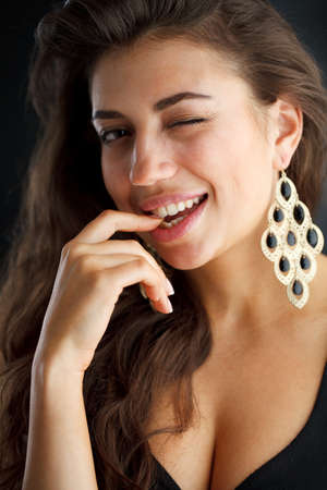 Portrait of woman over dark.の写真素材